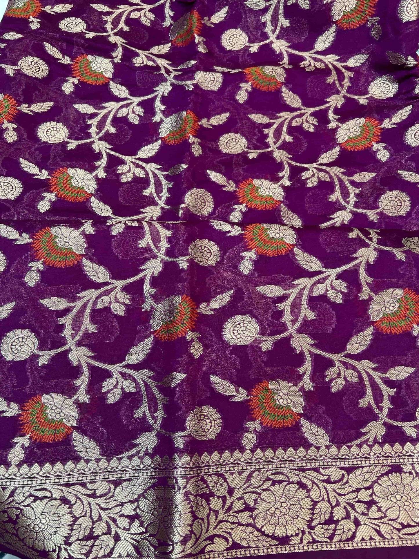 Purple jaal meenakari work georgette banarasi silk saree Niaura