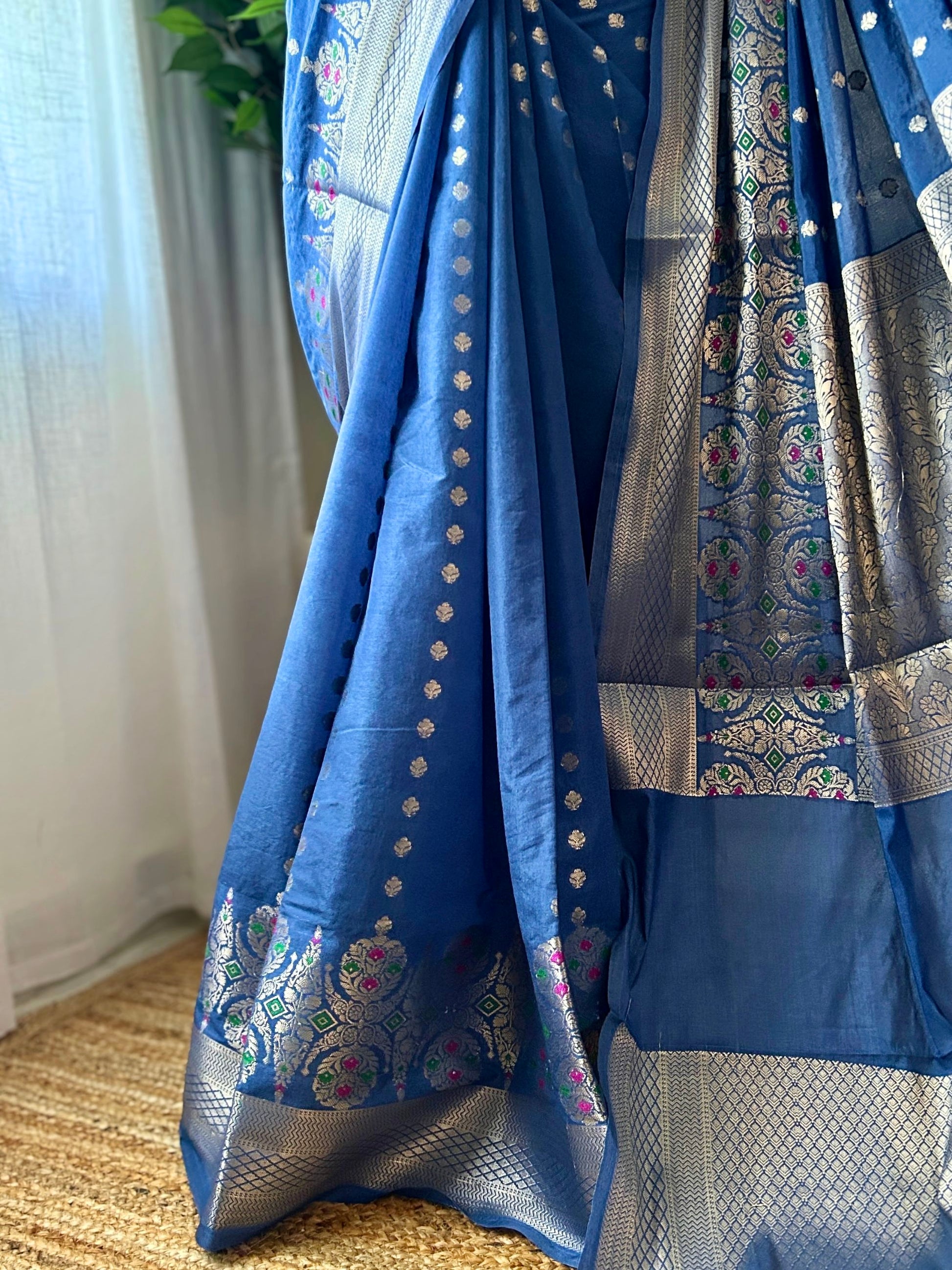 Silver zari dotted body detail on blue Banarasi saree