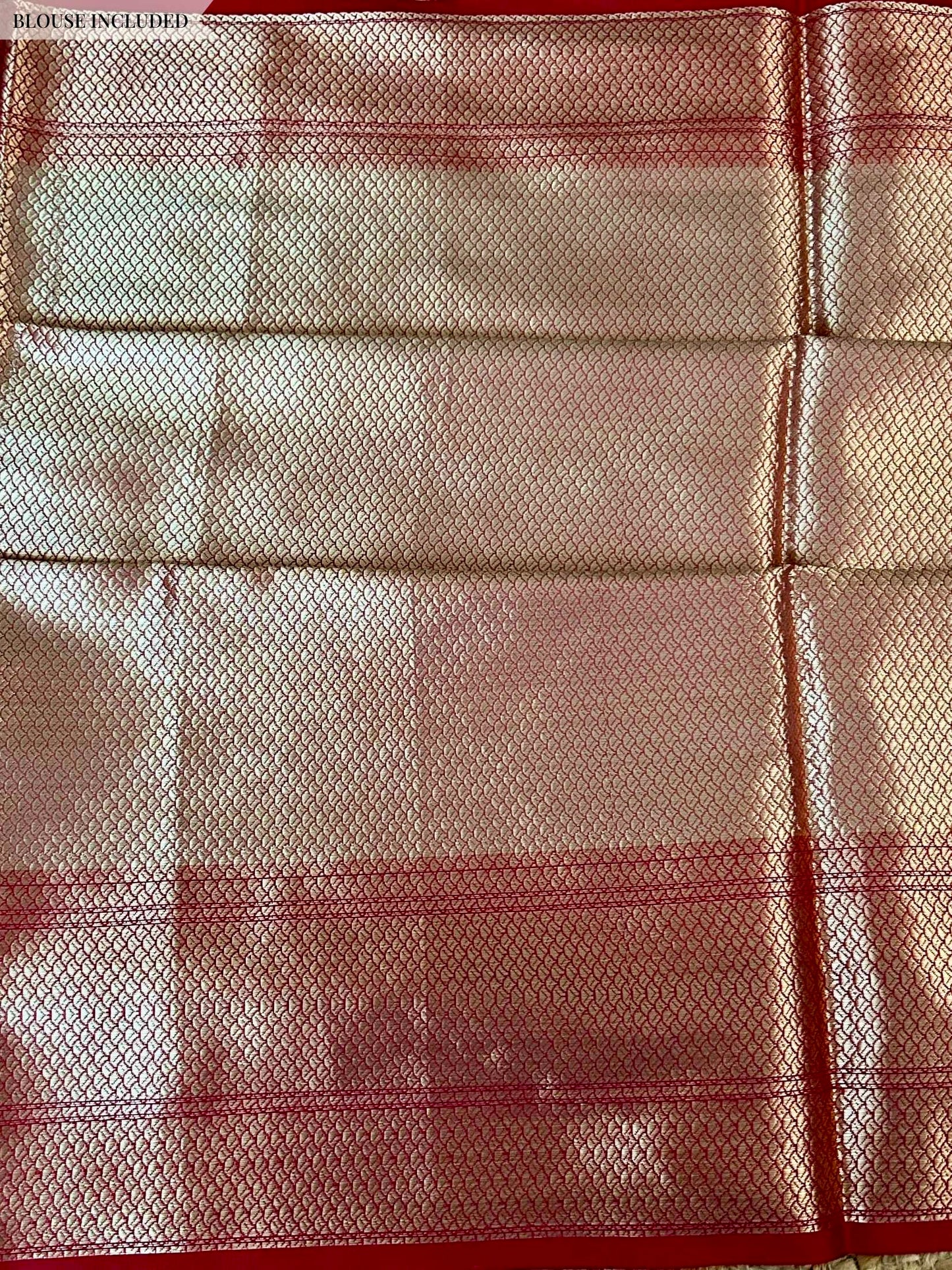 Brocade blouse piece included with orange yellow Banarasi saree
